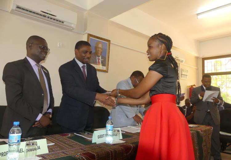  Jenifer Tairo Carol (Right) receiving Vice-Chancellor’s Prize for Best 1st Year Student in B.Sc,  Horticulture during 34th SUA prize giving ceremony