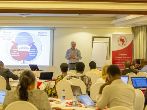 Dr. Tom Kennie of Ranmore Consult delivering a lecture on leading transformative academic and reseach change and innovation