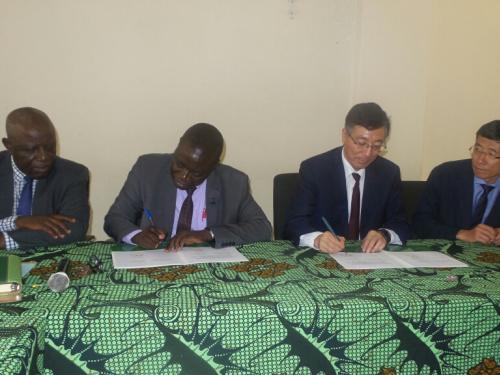 Sokoine University of Agriculture (SUA) Vice Chancellor Prof. Raphael Chibunda (Second left) and the President of China Agricultural University Prof. SUN QIXIN signing partnership agreement between the two universities