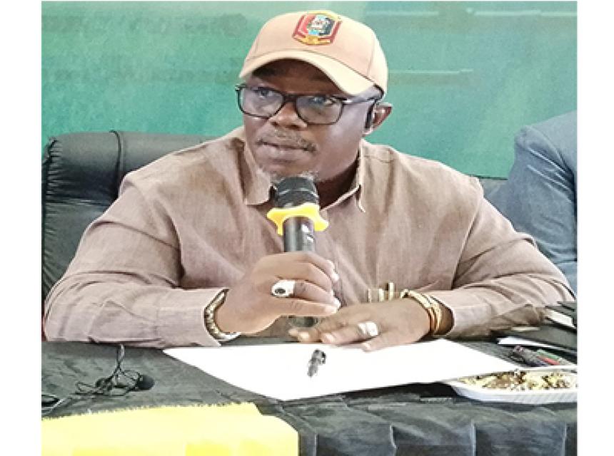 Morogoro Regional Commissioner Adam Malima talking to creative youth.